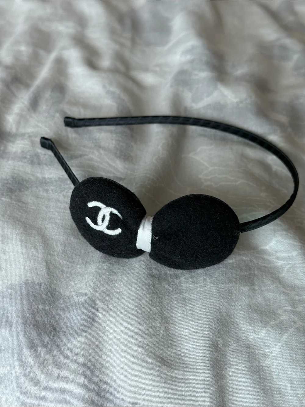 CHANEL Black Kids Headband with White Logo Bow Accent